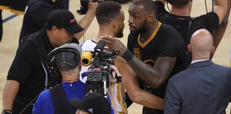 Jun 12, 2017; Oakland, CA, USA; Golden State Warriors guard Stephen Curry (30) hugs Cleveland Cavaliers forward LeBron James (23) after game five of the 2017 NBA Finals at Oracle Arena. Mandatory Credit: Kyle Terada-USA TODAY Sports
