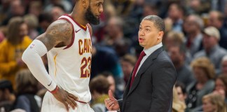 Jan 12, 2018; Indianapolis, IN, USA; Cleveland Cavaliers forward LeBron James (23) and head coach Tyronn Lue talk during a time out in the second half against the Indiana Pacers at Bankers Life Fieldhouse. Mandatory Credit: Trevor Ruszkowski-USA TODAY Sports